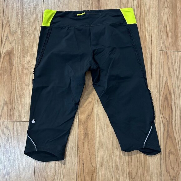 Lululemon Run Fast Free Crop Capri Leggings Womens 10 Ruffle Black Neon Yellow - Picture 4 of 5